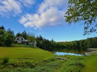 a lake in a wooded area